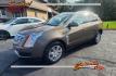 2014 BRONZE /Shale/Brownstone Accents CADILLAC SRX LUXURY COLLECT (3GYFNEE33ES) with an 3.6L engine, Automatic transmission, located at 101 S. Halleck St., DeMotte, 46310, (219) 987-2922, 41.202343, -87.198189 - Photo#0