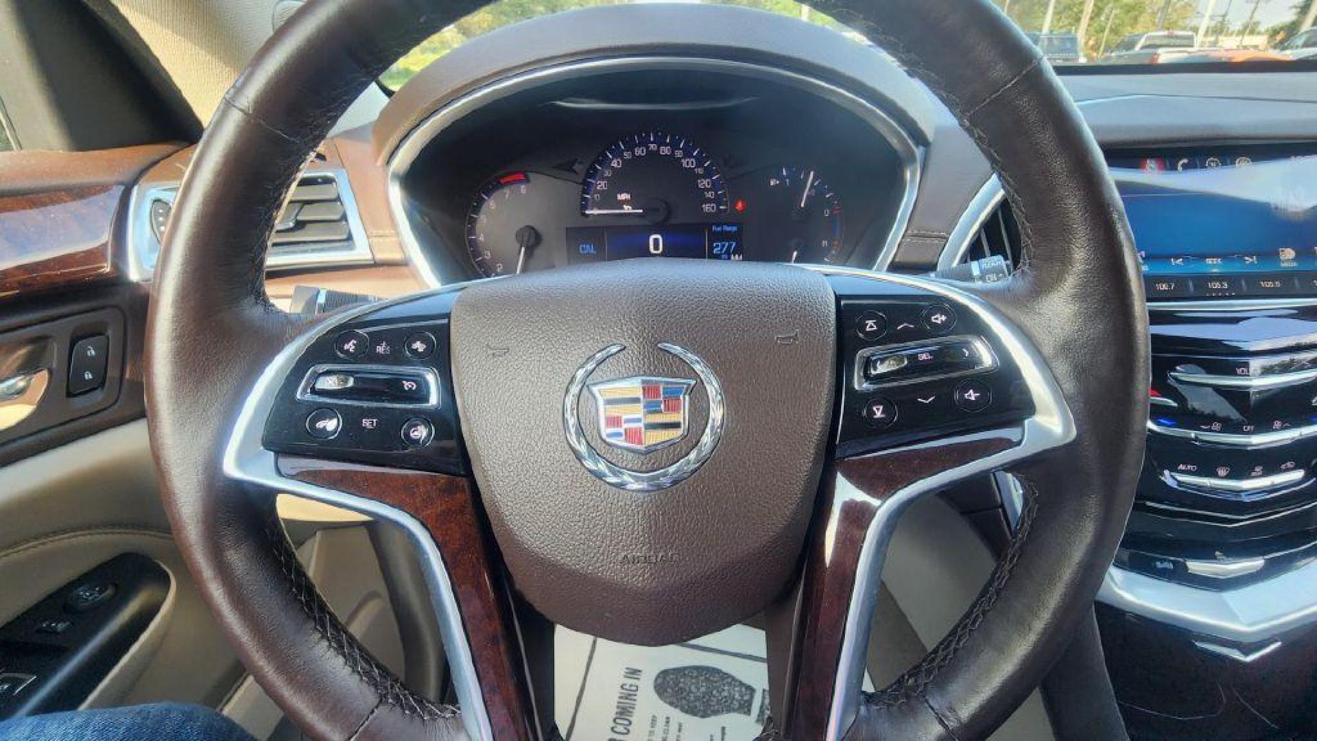 2014 BRONZE /Shale/Brownstone Accents CADILLAC SRX LUXURY COLLECT (3GYFNEE33ES) with an 3.6L engine, Automatic transmission, located at 101 S. Halleck St., DeMotte, 46310, (219) 987-2922, 41.202343, -87.198189 - Photo#10