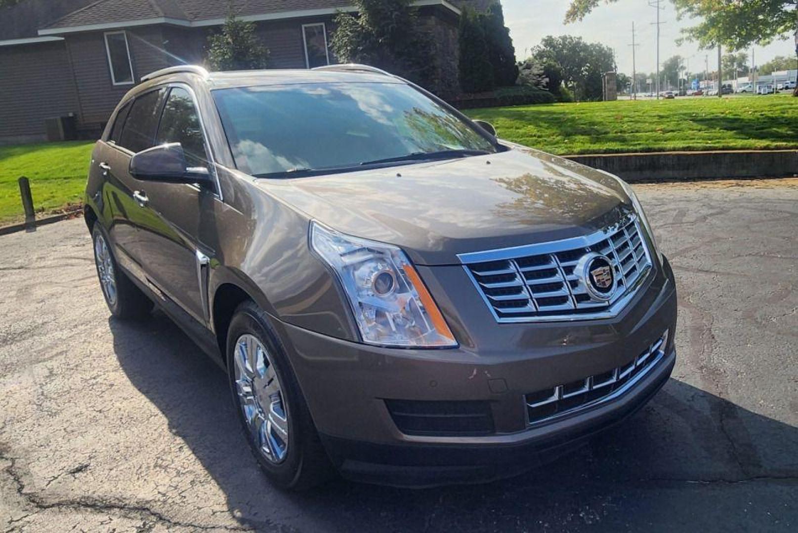 2014 BRONZE /Shale/Brownstone Accents CADILLAC SRX LUXURY COLLECT (3GYFNEE33ES) with an 3.6L engine, Automatic transmission, located at 101 S. Halleck St., DeMotte, 46310, (219) 987-2922, 41.202343, -87.198189 - Photo#1