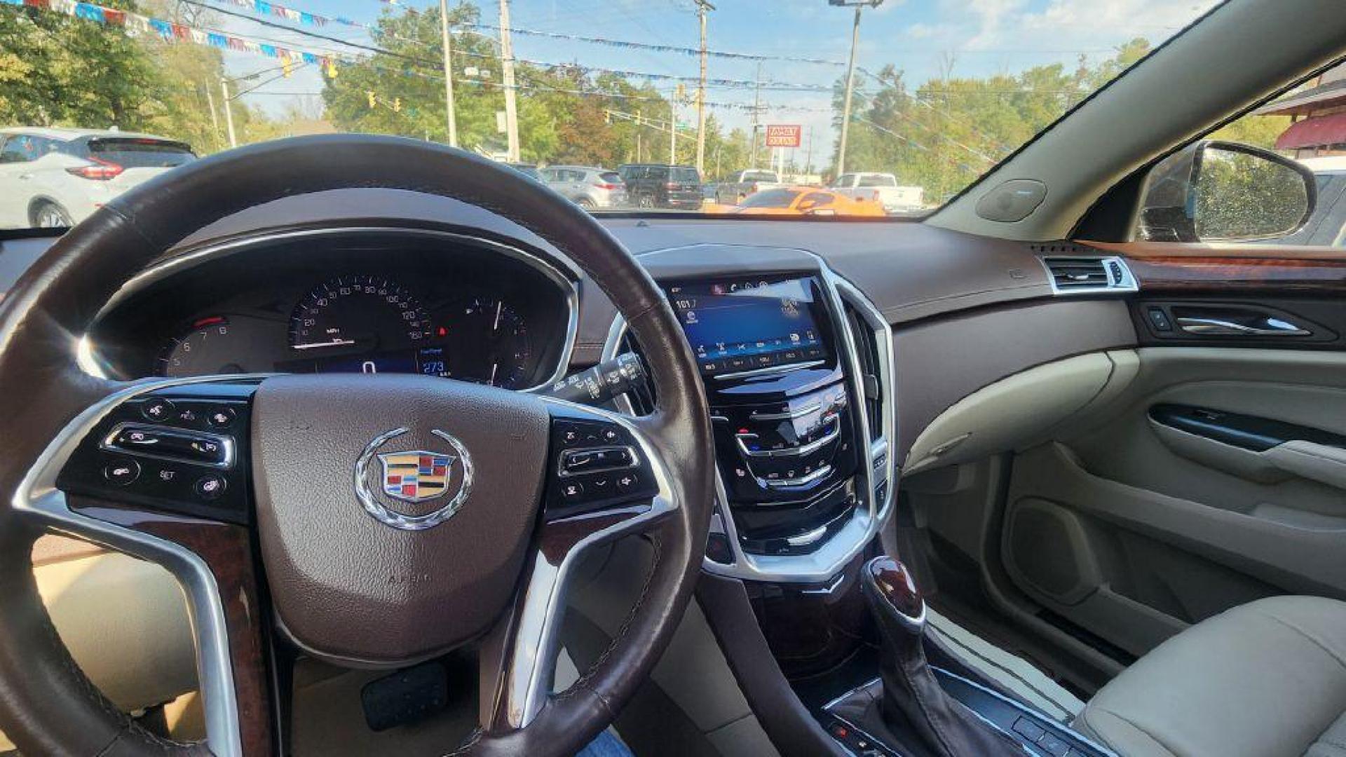 2014 BRONZE /Shale/Brownstone Accents CADILLAC SRX LUXURY COLLECT (3GYFNEE33ES) with an 3.6L engine, Automatic transmission, located at 101 S. Halleck St., DeMotte, 46310, (219) 987-2922, 41.202343, -87.198189 - Photo#8