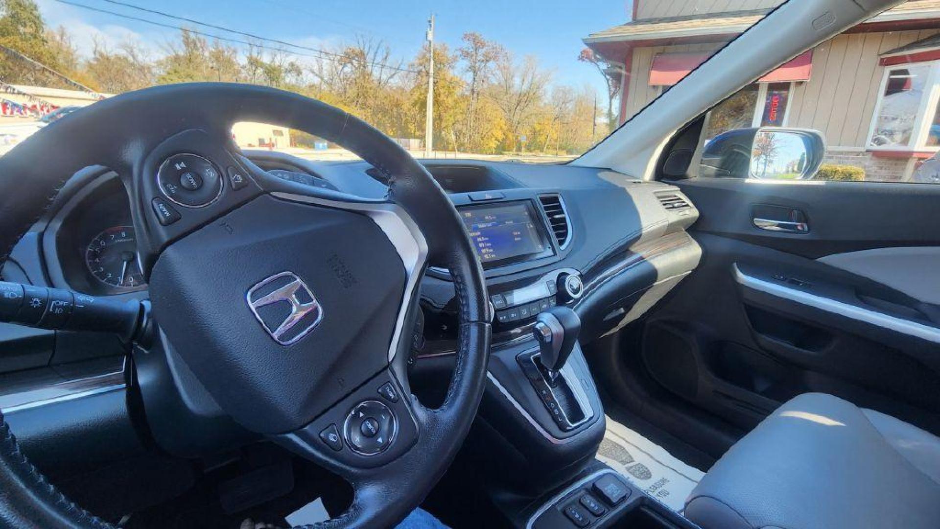 2015 BLUE /Gray, leather HONDA CR-V TOURING - AWD (5J6RM4H93FL) with an 2.4L engine, Continuously Variable transmission, located at 101 S. Halleck St., DeMotte, 46310, (219) 987-2922, 41.202343, -87.198189 - Photo#9