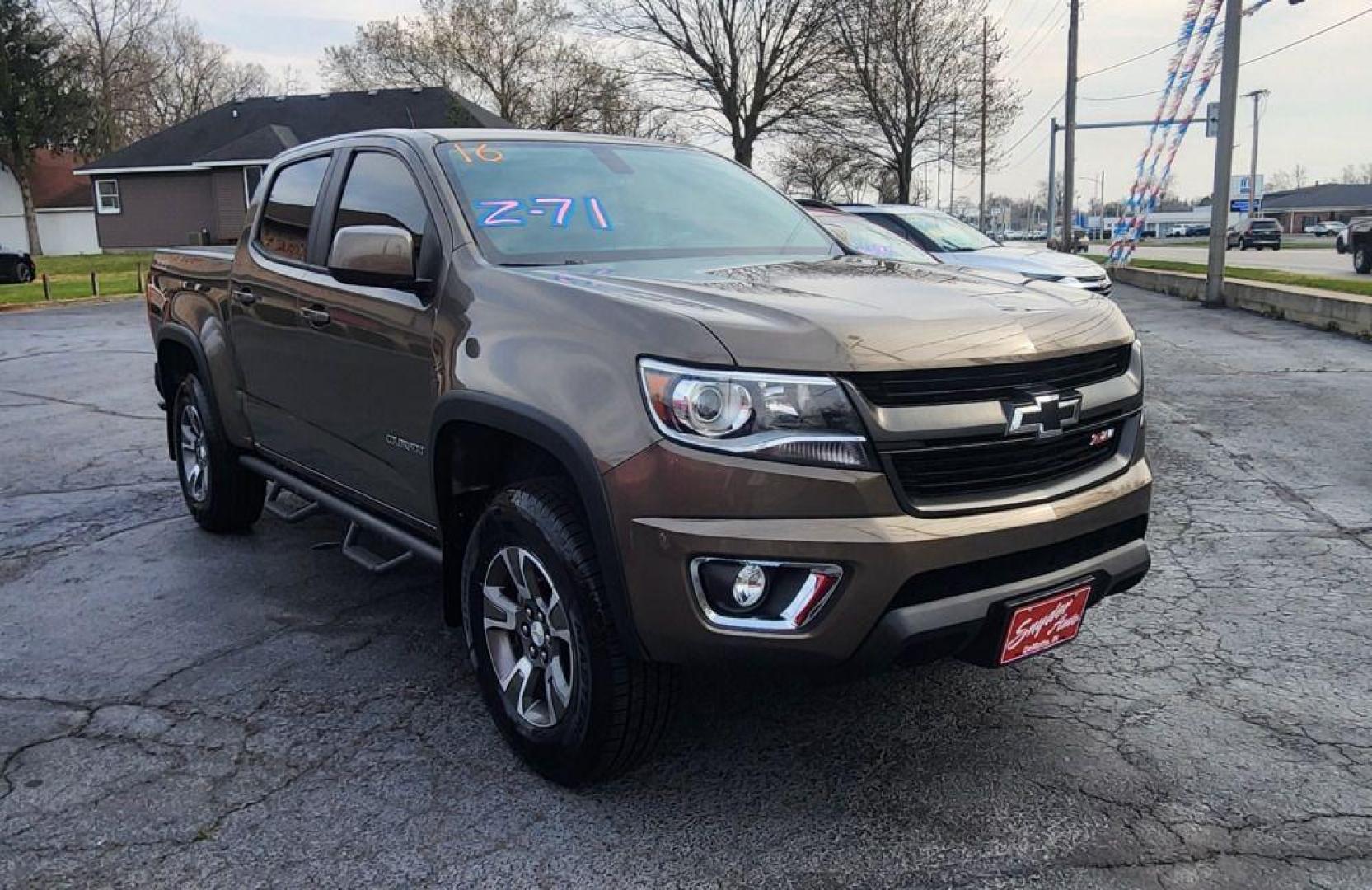 2016 BRONZE CHEVROLET COLORADO Z71 - 4WD (1GCGTDE36G1) with an 3.6L engine, Automatic transmission, located at 101 S. Halleck St., DeMotte, 46310, (219) 987-2922, 41.202343, -87.198189 - Photo#2