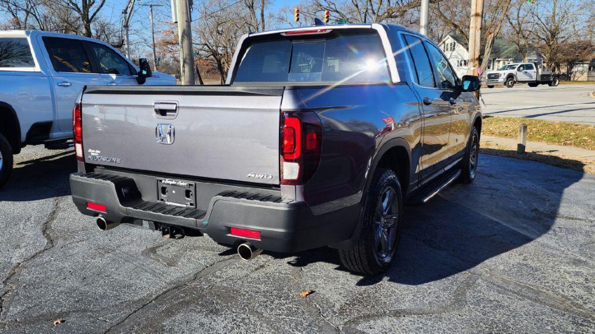 2022 GRAY HONDA RIDGELINE RTL - AWD (5FPYK3F52NB) with an 3.5L engine, Automatic transmission, located at 101 S. Halleck St., DeMotte, 46310, (219) 987-2922, 41.202343, -87.198189 - Photo#2