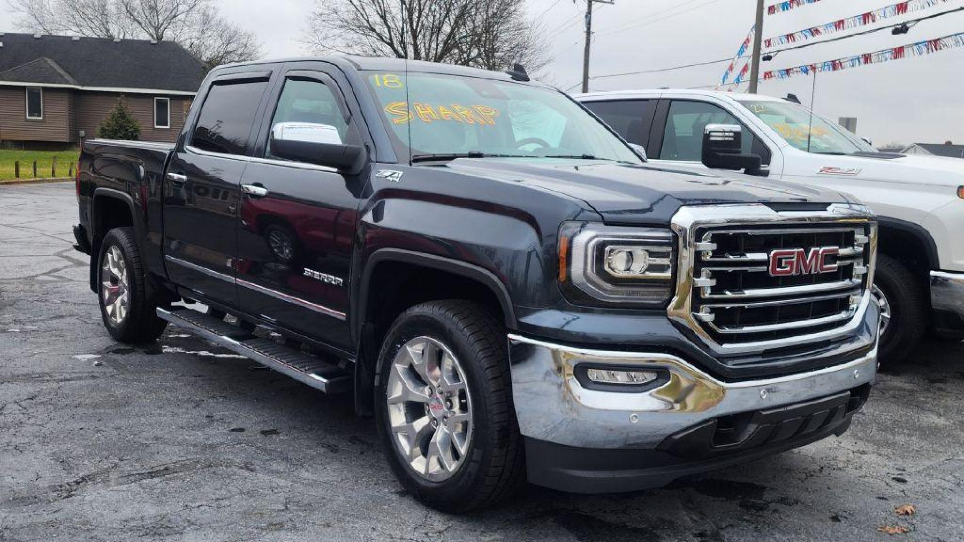 2018 GRAY GMC SIERRA 1500 SLT (3GTU2NECXJG) with an 5.3L engine, Automatic transmission, located at 101 S. Halleck St., DeMotte, 46310, (219) 987-2922, 41.202343, -87.198189 - Photo#1