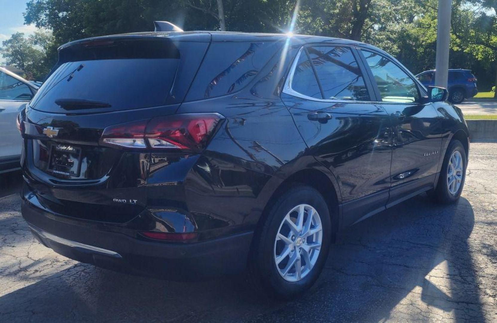 2023 BLACK CHEVROLET EQUINOX LT-AWD (3GNAXTEG7PL) with an 1.5L engine, Automatic transmission, located at 101 S. Halleck St., DeMotte, 46310, (219) 987-2922, 41.202343, -87.198189 - Photo#2