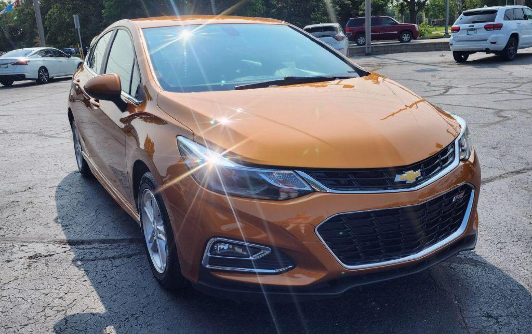 2017 ORANGE CHEVROLET CRUZE LT (3G1BE6SM4HS) with an 1.4L engine, Automatic transmission, located at 101 S. Halleck St., DeMotte, 46310, (219) 987-2922, 41.202343, -87.198189 - Photo#1