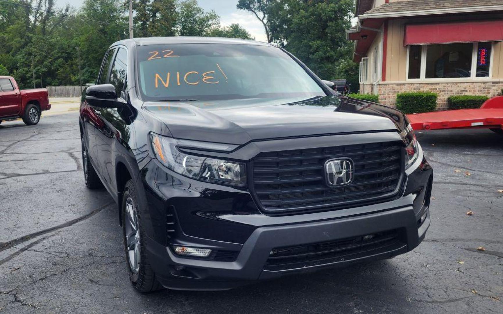 2022 BLACK HONDA RIDGELINE RTL - AWD (5FPYK3F58NB) with an 3.5L engine, Automatic transmission, located at 101 S. Halleck St., DeMotte, 46310, (219) 987-2922, 41.202343, -87.198189 - Photo#1