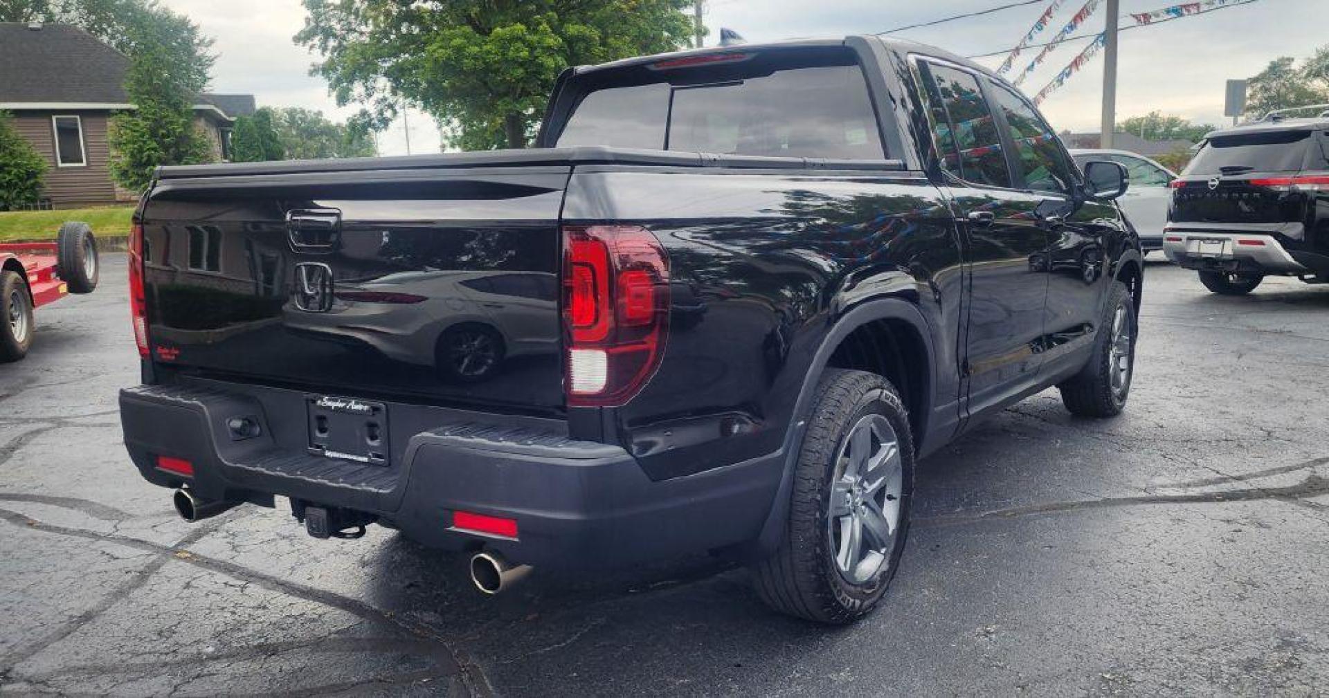 2022 BLACK HONDA RIDGELINE RTL - AWD (5FPYK3F58NB) with an 3.5L engine, Automatic transmission, located at 101 S. Halleck St., DeMotte, 46310, (219) 987-2922, 41.202343, -87.198189 - Photo#2