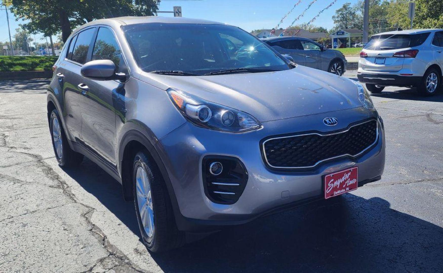 2018 SILVER KIA SPORTAGE LX - AWD (KNDPMCAC3J7) with an 2.4L engine, Automatic transmission, located at 101 S. Halleck St., DeMotte, 46310, (219) 987-2922, 41.202343, -87.198189 - Photo#1