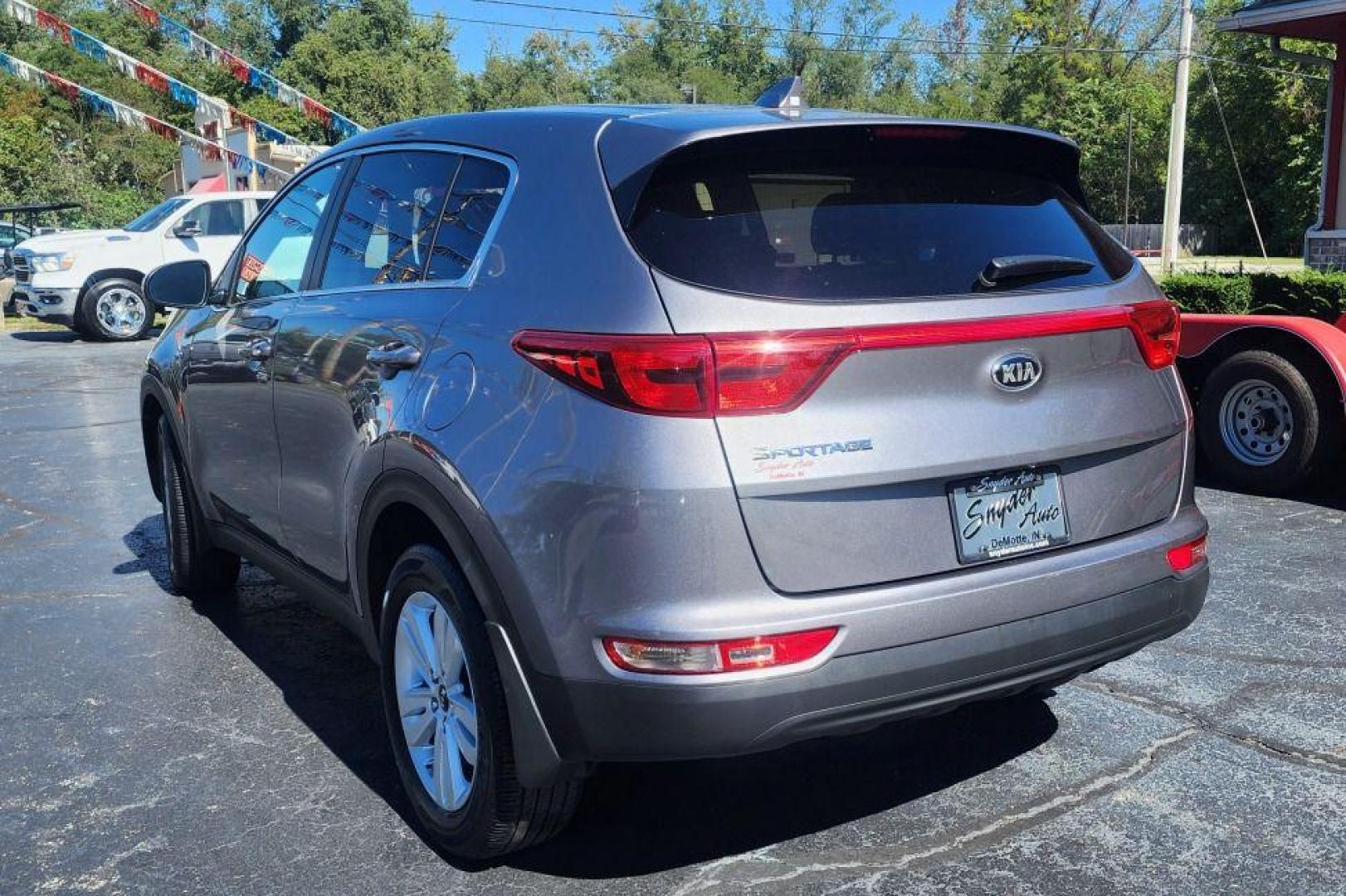 2018 SILVER KIA SPORTAGE LX - AWD (KNDPMCAC3J7) with an 2.4L engine, Automatic transmission, located at 101 S. Halleck St., DeMotte, 46310, (219) 987-2922, 41.202343, -87.198189 - Photo#3